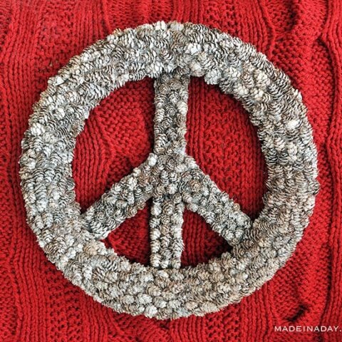 Image for Flocked Pine Cone Peace Sign
