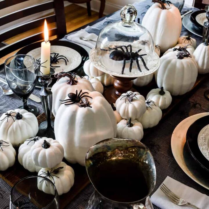 Image for Halloween Tablescape Featuring Creepy Plastic Spiders
