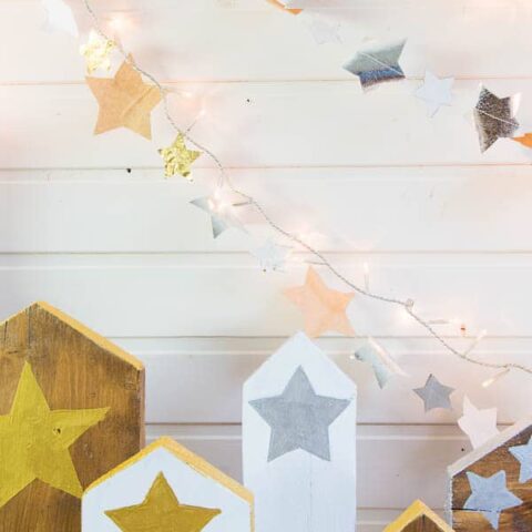 Image for DIY Christmas Mantel Decor with Garlands and Wooden Houses